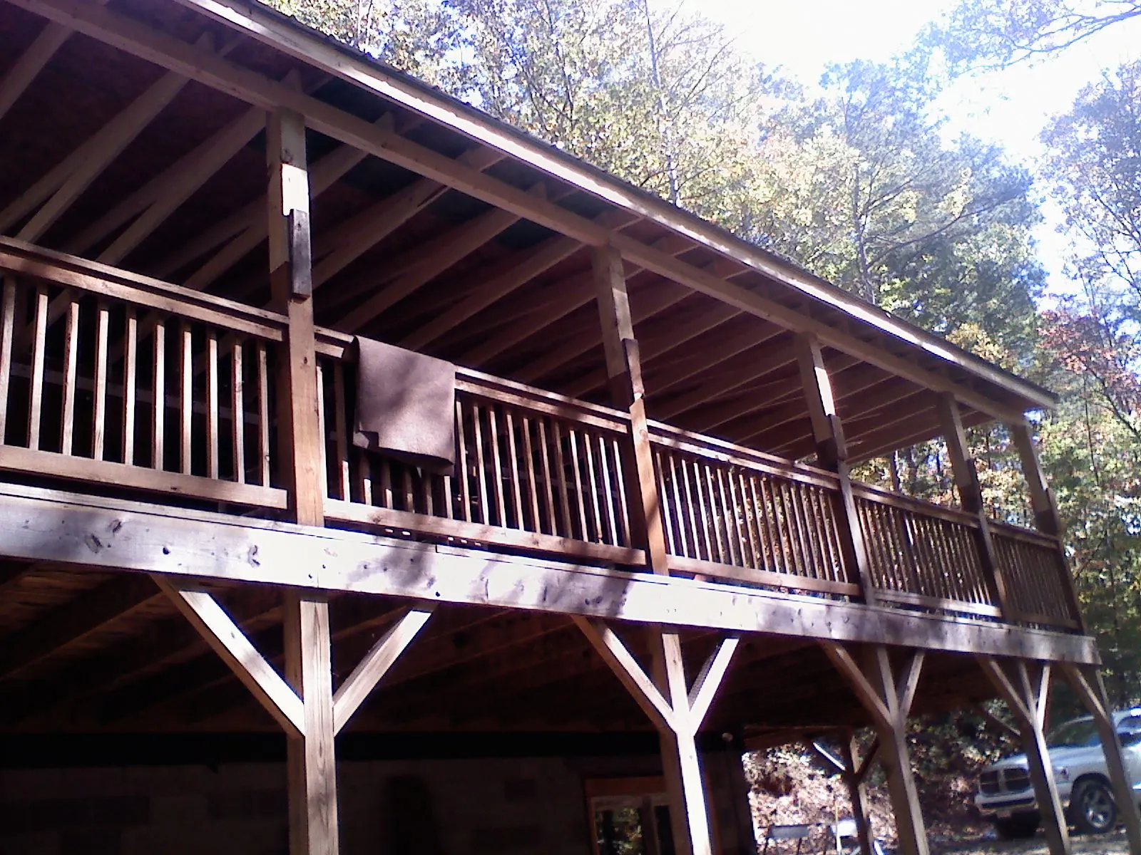 Timber framing under a new elevated porch and deck — Roof Leak Repair in Evansdale by Roofing Brothers